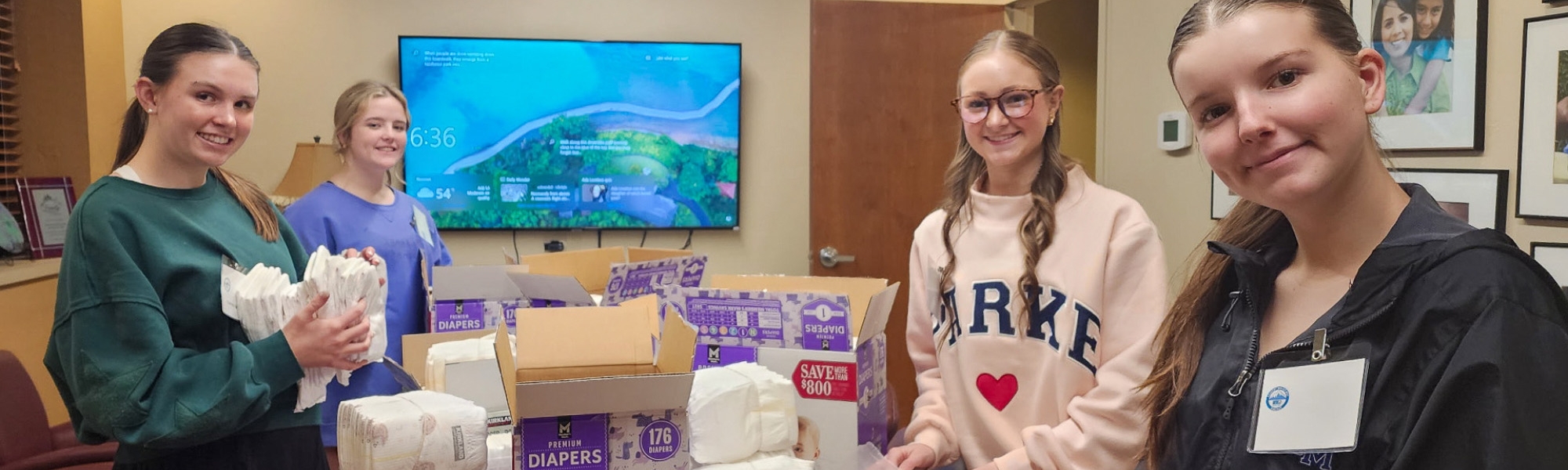 Youth organize diaper pantry
